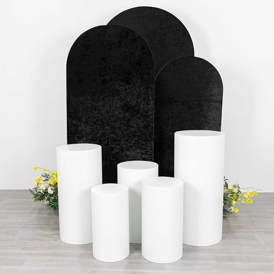 Cylinder stands with black and white arch rental package for stylish event decoration in Atlanta, GA